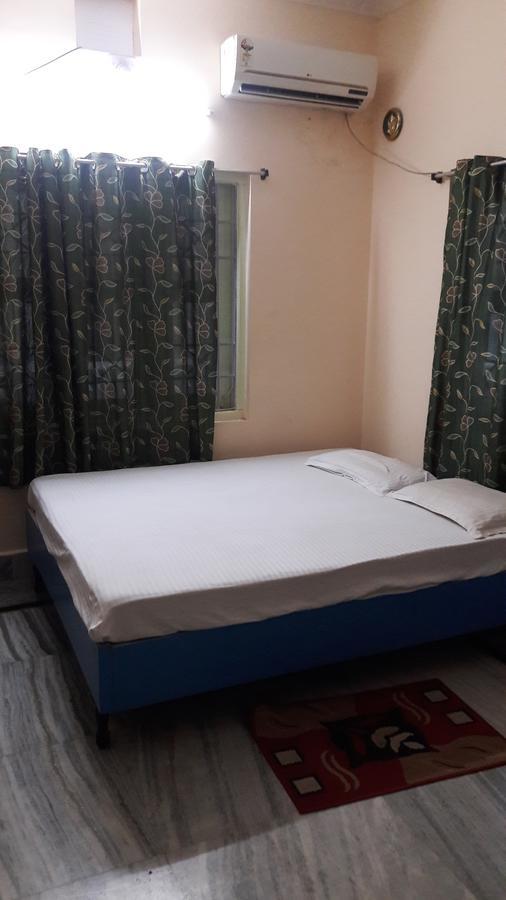 Shanti Guesthouse Bhuvanéšvar Pokoj fotografie